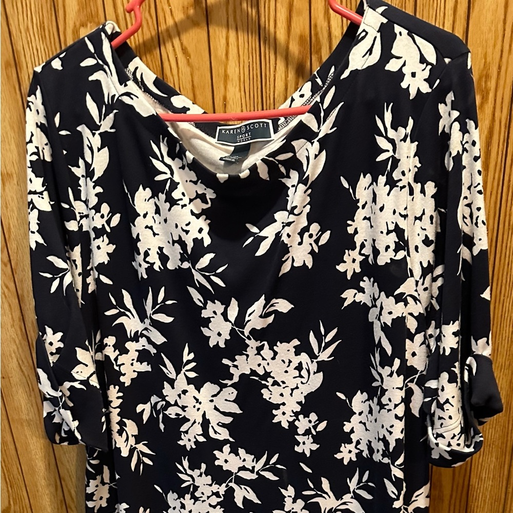 Navy blue with white flowers, above the knee. Super cute spring summer dress.